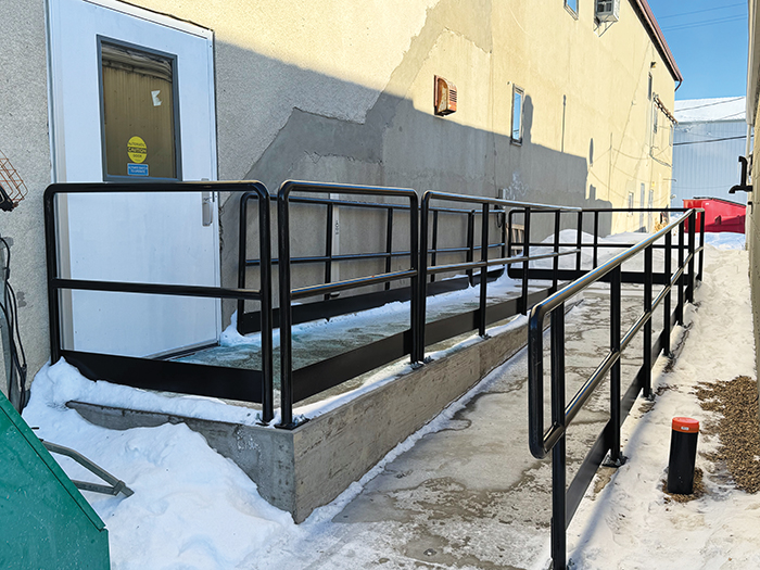 On the south side of the hall, a new and improved accessible ramp was added to the Carlyle Memorial hall.